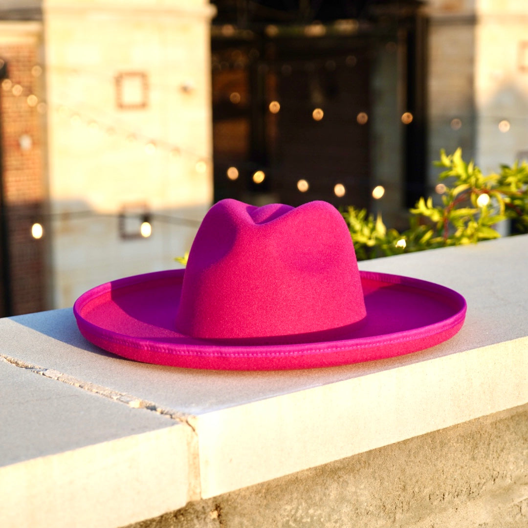 Wholesale Fedoras pencil rolled brim hat in pink color.